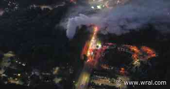 Firefighter injured in Durham house fire on Garrett Road
