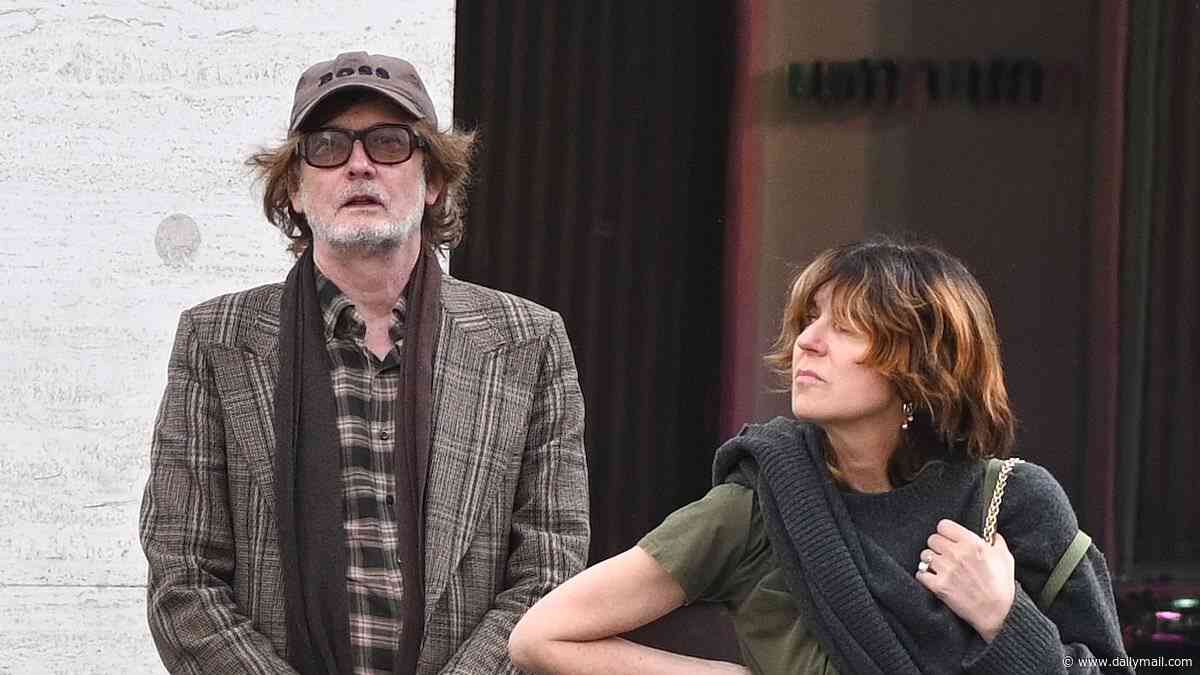 Pulp's Jarvis Cocker makes rare appearance with wife Kim Sion as they enjoy a designer shopping spree at Gucci