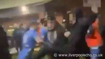 Children 'led away in tears' as players and fans brawl after Merseyside football match