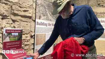 City walls 'tap to donate' raises nearly £9,000