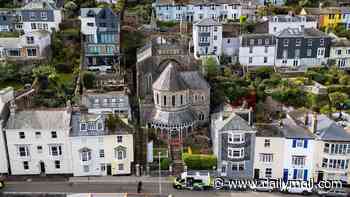 Woman in her 40s found dead and man in hospital after 'axe attack' in seaside town as suspect arrested for murder