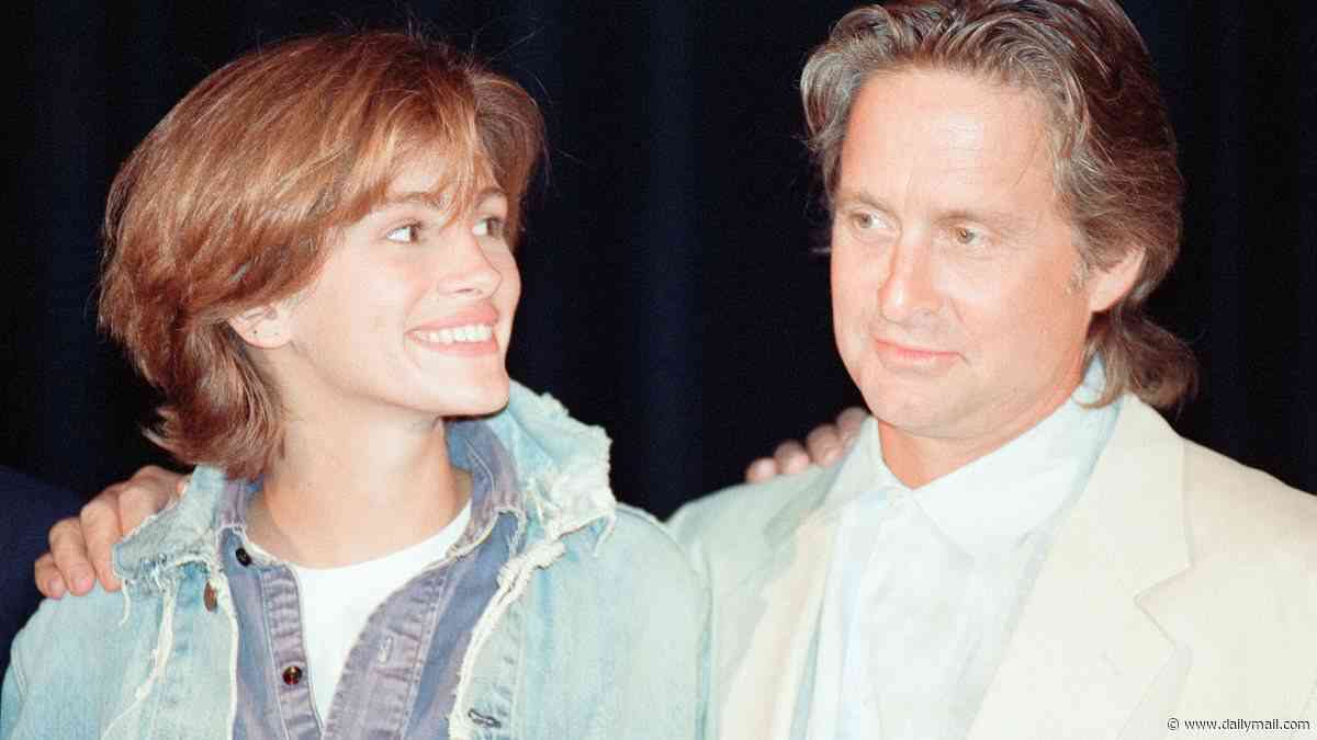 Michael Douglas drunkenly threatened Julia Roberts and told her to 'stick her Golden Globe where the sun don't shine' in a 'wildly embarrassing' incident at the height of his addiction