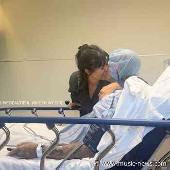 Travis Barker supported by wife Kourtney Kardashian following hospitalisation