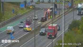 Two injured after M8 crash sparks long delays