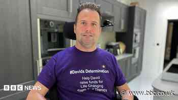 Dad regaining movement after breaking neck