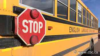Collision between school bus and gravel truck north of Stratford sends 2 people to hospital