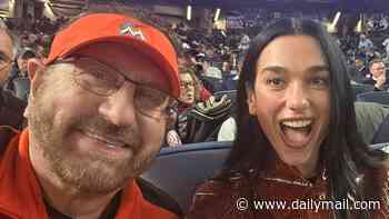 Dua Lipa goes viral as she is caught chatting to renowned baseball superfan Marlins Man in bizarre moment at Yankees game