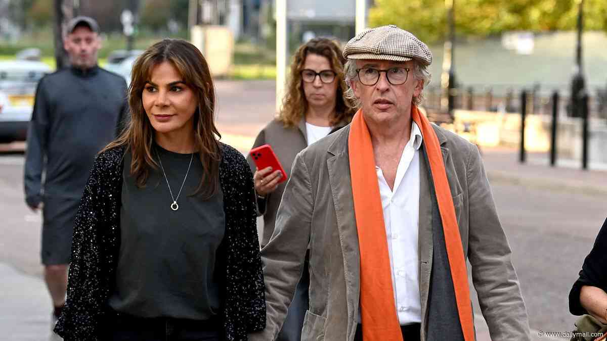 Steve Coogan appears to confirm new romance as he holds hands with strategy director Katy Kamaee while stepping out in Manchester