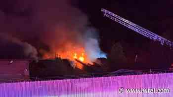 Firefighter killed in fire that tore through building in southeast Durham
