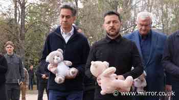 Ed Miliband lays teddy at Ukraine wreckage where 22 people including three one-year-olds killed