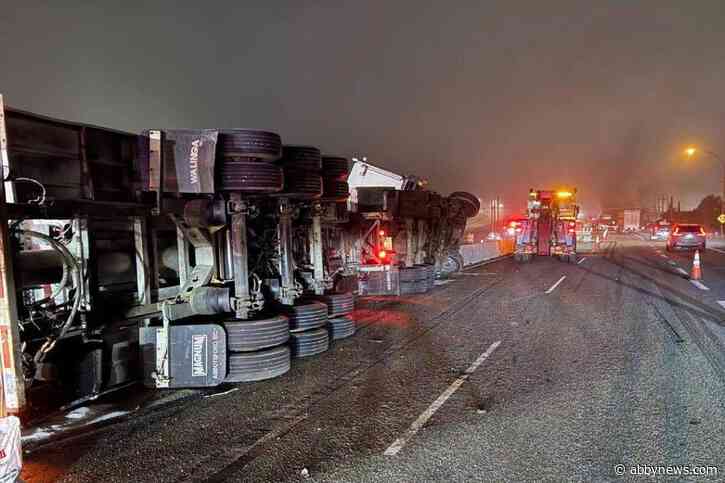 Grain truck flips on Highway 1 in Abbotsford