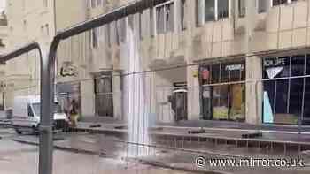 Floods bring chaos to busy street leaving businesses and homes without water