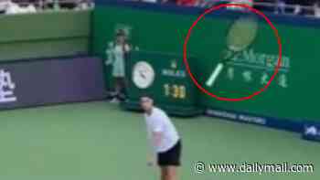 Furious French tennis star LAUNCHES his racquet at the crowd in mid-match meltdown - but escapes being kicked out of tournament in a stroke of luck