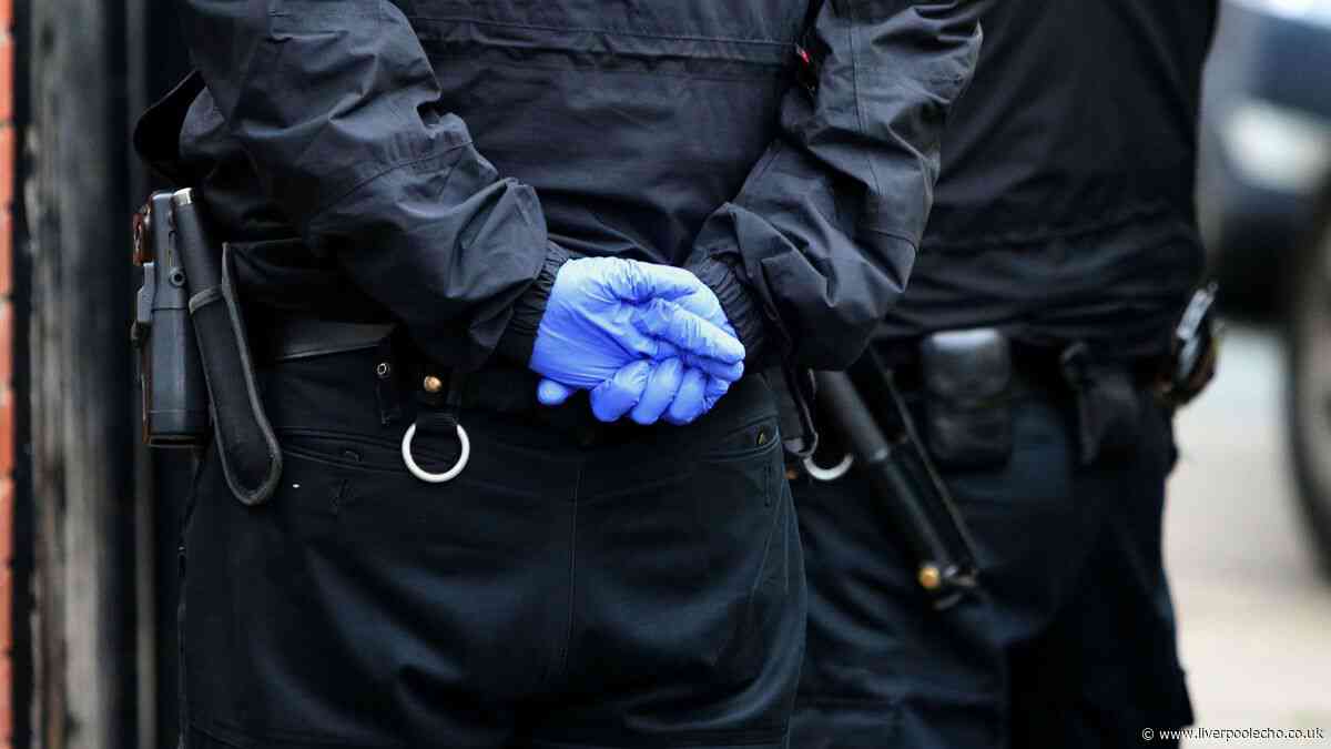 Man arrested after what police found hidden behind his wall in Woolton