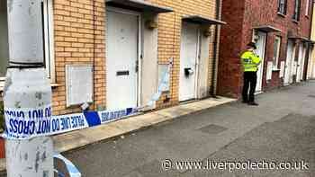Police cordon off Tranmere flat as woman arrested following attack