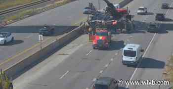 Cement mixer truck rolls over on I-190, driver hurt