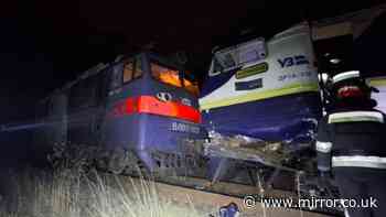 Passengers scramble from carriages after two trains collide in Ukraine leaving five injured