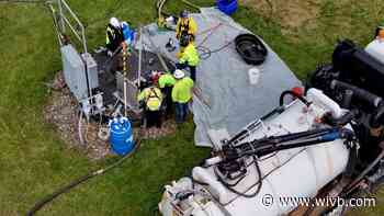 Hazmat suits, vacuum truck, and blue drums: What's going on at Love Canal?