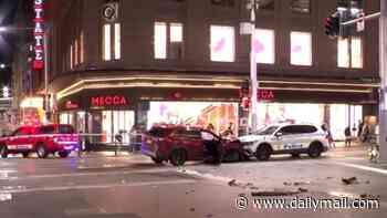 Man carjacks woman before ploughing into police car and striking pedestrian in Sydney CBD rampage