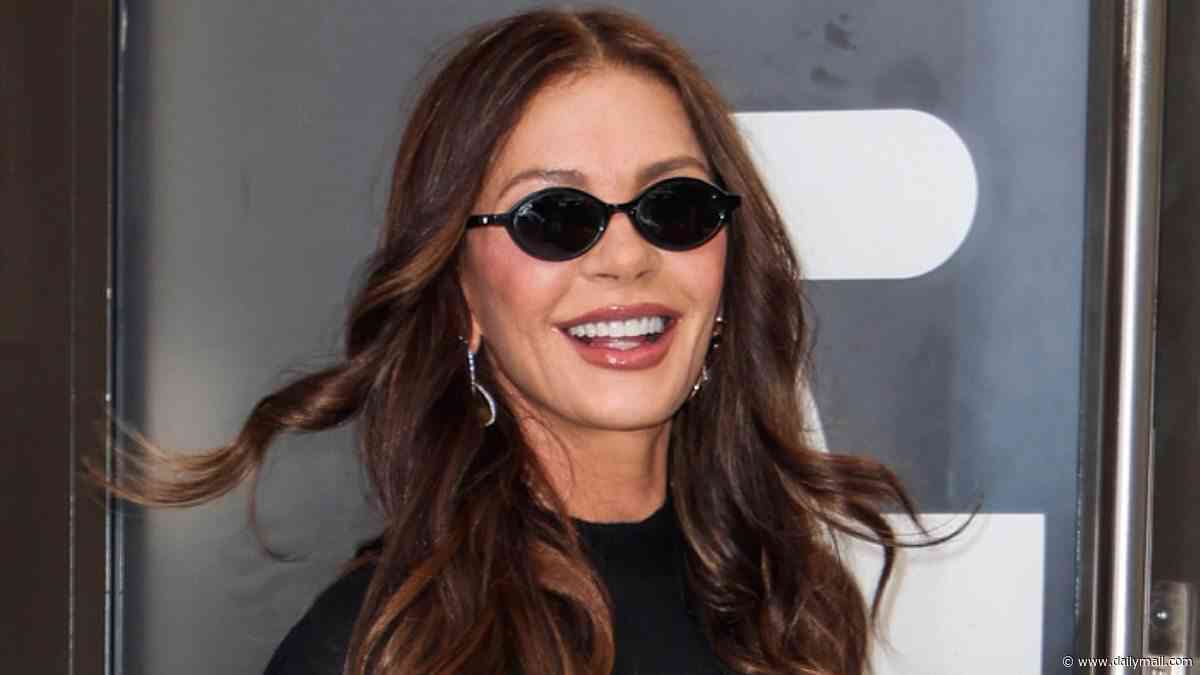 Catherine Zeta-Jones sizzles in tight black leather as she finally breaks silence on husband Michael Douglas' scandalous sex-filled memoir