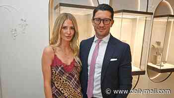Millie Mackintoch and her new boyfriend Matthew Tanner make their first public appearance as they browse diamonds at the Boodles jewellery event - eight months after split from ex husband Hugo Taylor