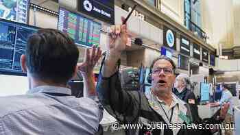 Wall Street dips as crude oil prices jump