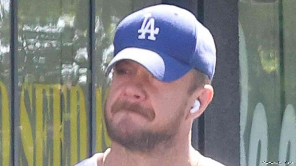 Minka Kelly's ex Dan Reynolds emerges looking heartbroken in public following the couple's shock split