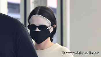 Selena Gomez takes her beauty routine to the extreme by wearing a skincare mask in public in bizarre display