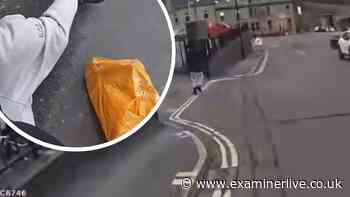 Moment officer sprints at suspect after 'running rings' with body cam 'shaking'