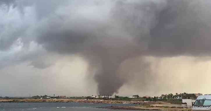 Devastating waterspout tears through Sicily overturning cars and damaging school