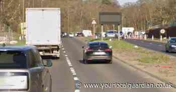 Motorcycle rider dies in van crash as key Surrey road stays shut for hours