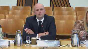 SNP minister faces 'cover-up' storm after emails show his office was alerted to ferry gas leak... but he told committee he hadn't been briefed