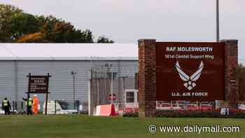 Two Latvians arrested for trespass after 'breaking through perimeter fence' at RAF base used by US military intelligence are released on bail