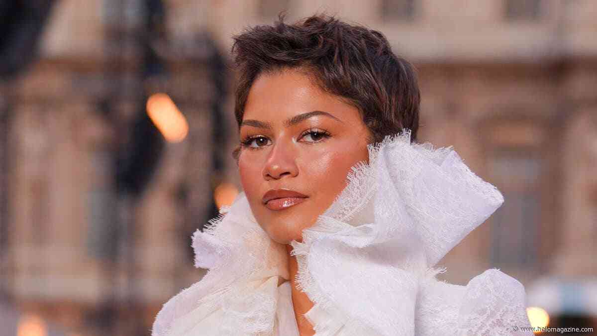 Zendaya poses ab-baring lace and curve-sculpting jeans after biggest hair transformation of 2026