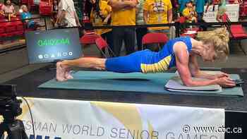 Alberta woman, 61, breaks her own world record by planking for 5 hours