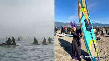 Hundreds of witches paddleboard off Vancouver | The Moment