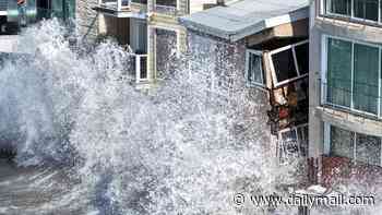 Stunning beachfront home starts to crumble into the ocean as California is battered by yet another storm
