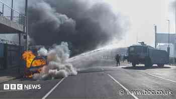 Cars torched and shops looted as anti-migrant violence erupts in South Africa