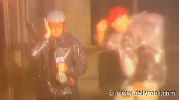 Weatherman panned for 'dramatically bracing' in Hurricane Isaias winds as local nonchalantly walks through frame