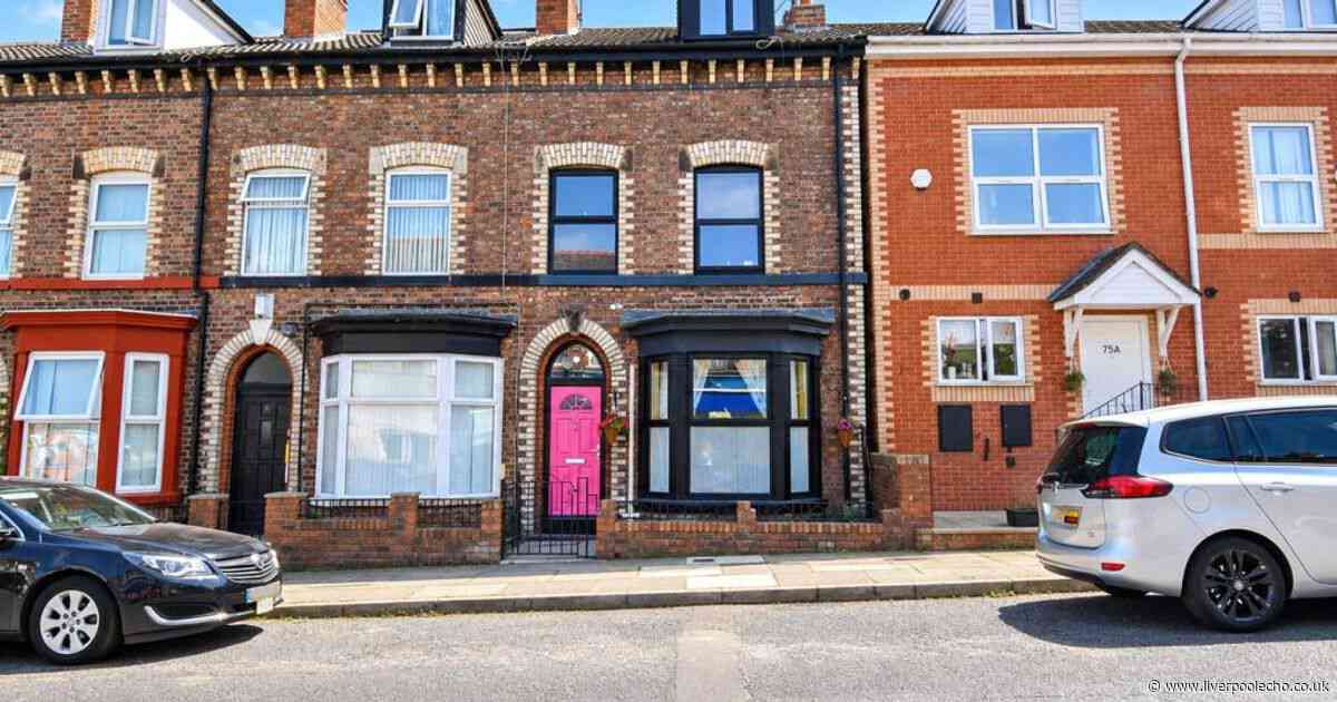 Birkenhead home's bright pink door gives a hint of what is behind it
