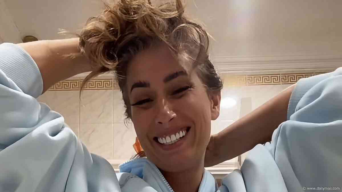 Stacey Solomon shows off the renovated orange bathroom at her new £2M Essex mansion as she upcycles garish sink, toilet and bath and jokes 'I'm ready for people to hate this!'