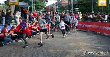 Eerste kinderen ‘vliegen’ over het parcours tijdens de Kidsrun van de Eindhovense marathon