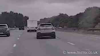Shocking moment Audi driver weaves through M56 traffic in 165mph police chase