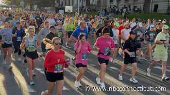 Hartford Marathon runners cross the same finish line, each with a different story