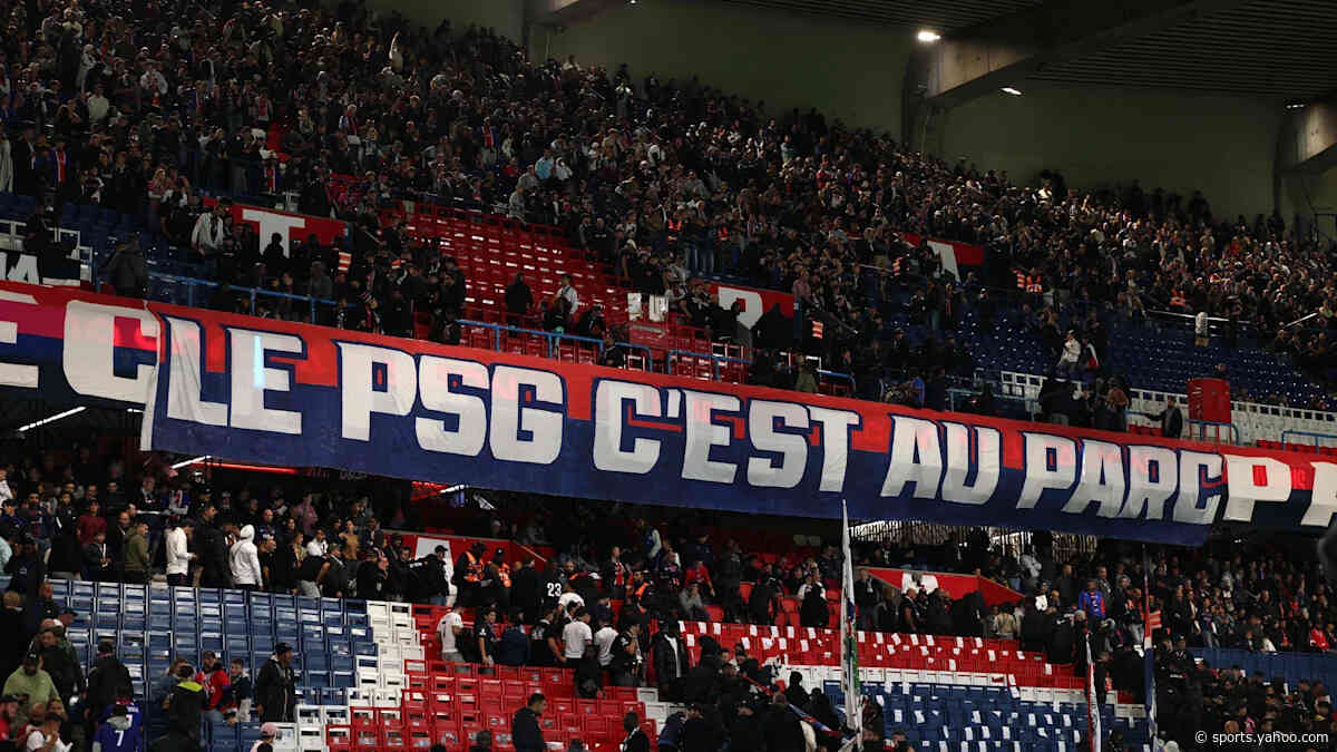 PSG ultras leave the stadium after a banner is removed