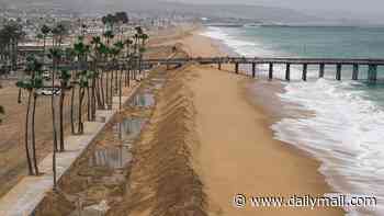 Tropical storm Rachel forces iconic California beach to close as severe flooding threatens millions