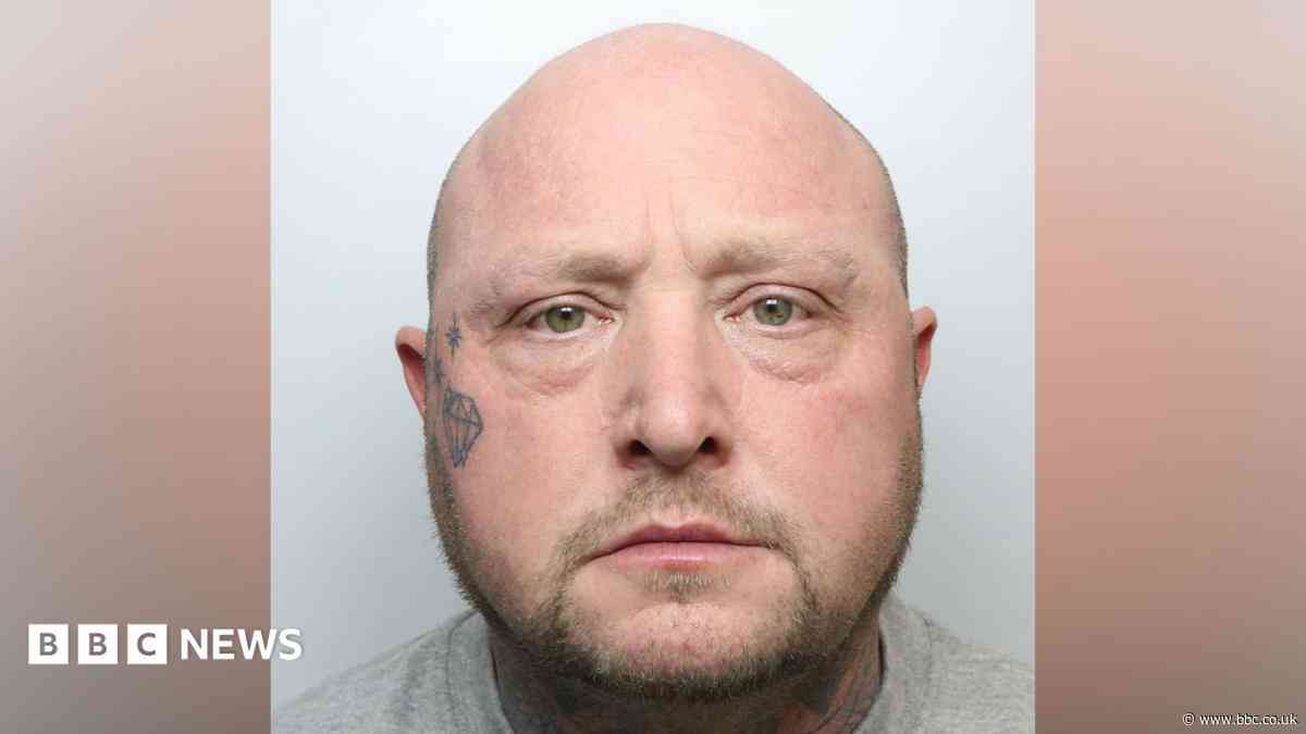Man who kept wife's body in freezer jailed for life