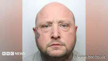 Man who kept wife's body in freezer jailed for life