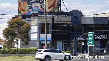 Sam Wood's gym signage suddenly disappears as details emerge of his multimillion-dollar property deals thrown into chaos by his arrest