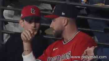 Travis Kelce makes surprise appearance at Cleveland Guardians' crucial MLB playoff clash after buying stake in team... but there's no sign of wife Taylor Swift